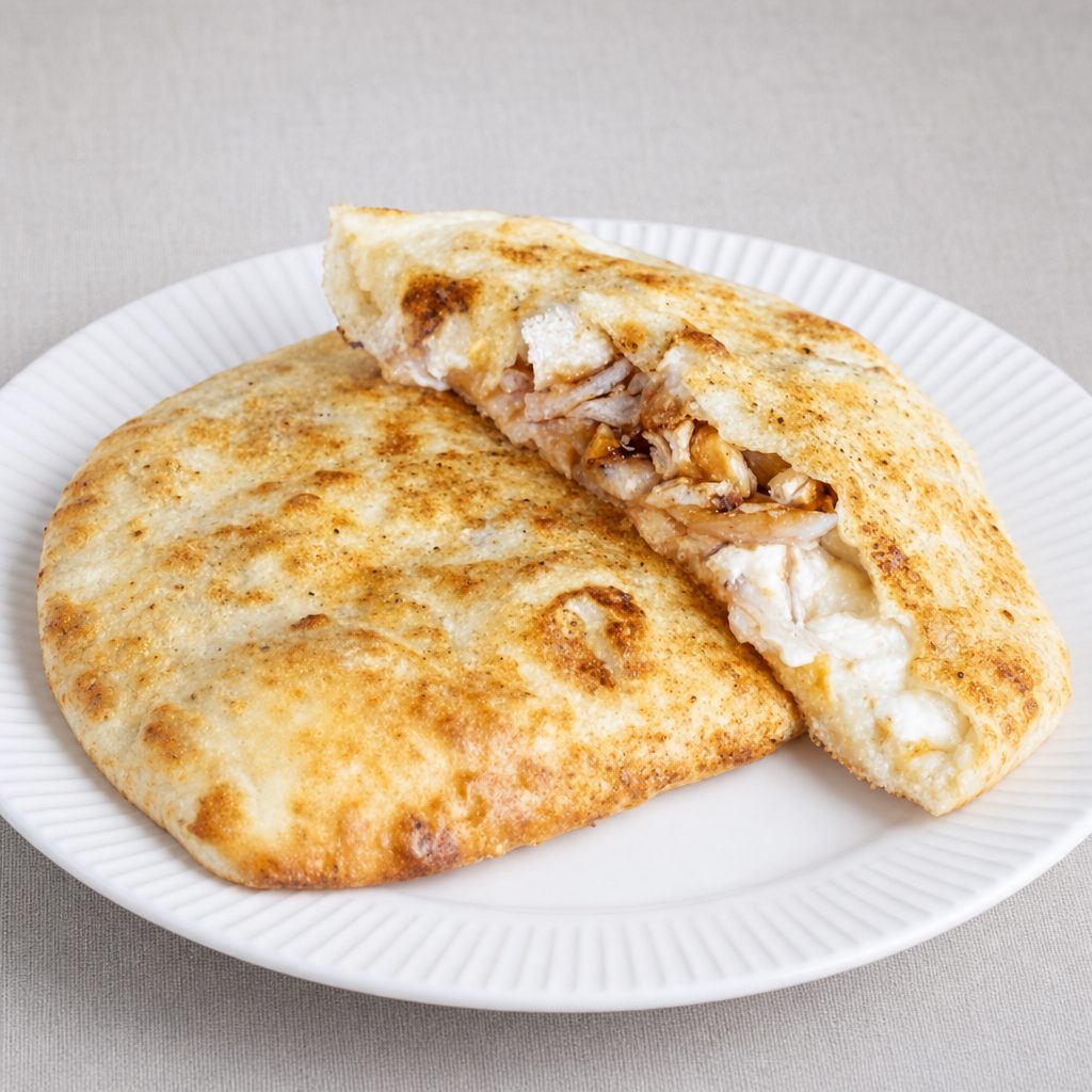 Chicken Tikkah Pizza Calzone.